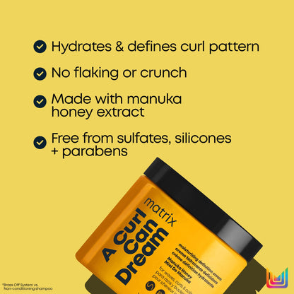 A Curl Can Dream Moisturizing Cream Matrix 
This leave-in cream that provides moisture and definition, without flaking or crunch.