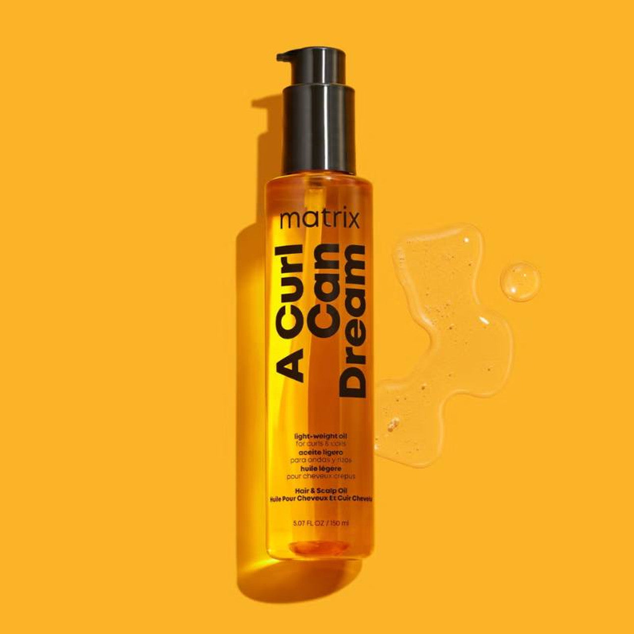 A Curl Can Dream Lightweight Oil Matrix
This is the perfect finisher to separate out curls and add shine.